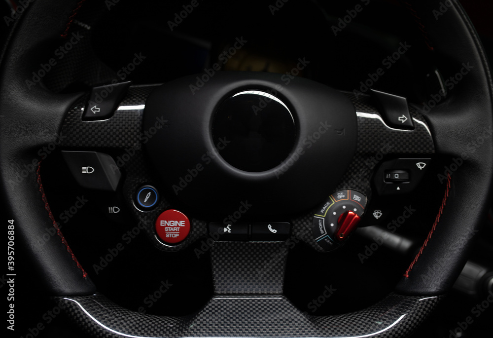 black steering wheel of a luxury sports car