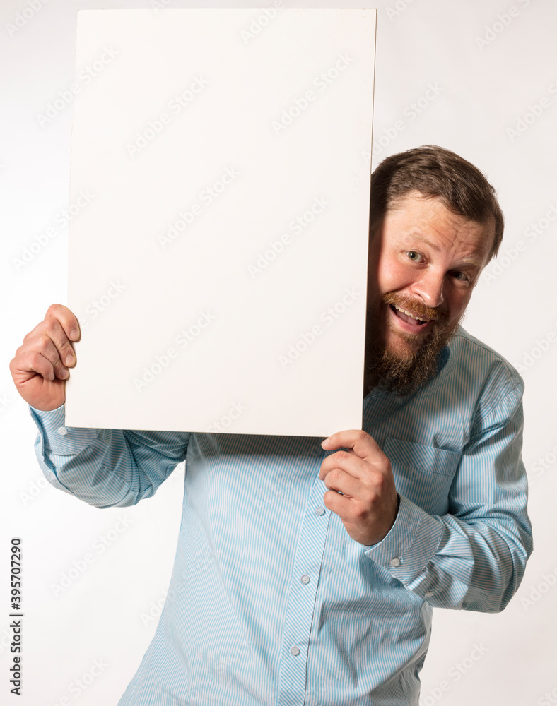 Joyful bearded man with blank paper folio studio portrait Joyful bearded man with blank paper folio studio portrait