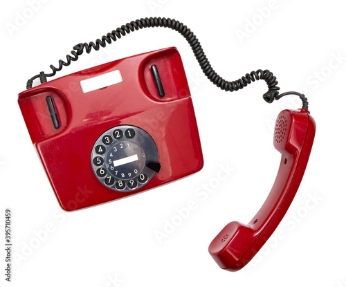 isolated old style red phone off the hook on white