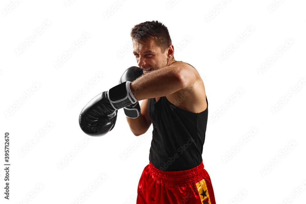 boxer man in black boxing gloves punching isolated on white background.