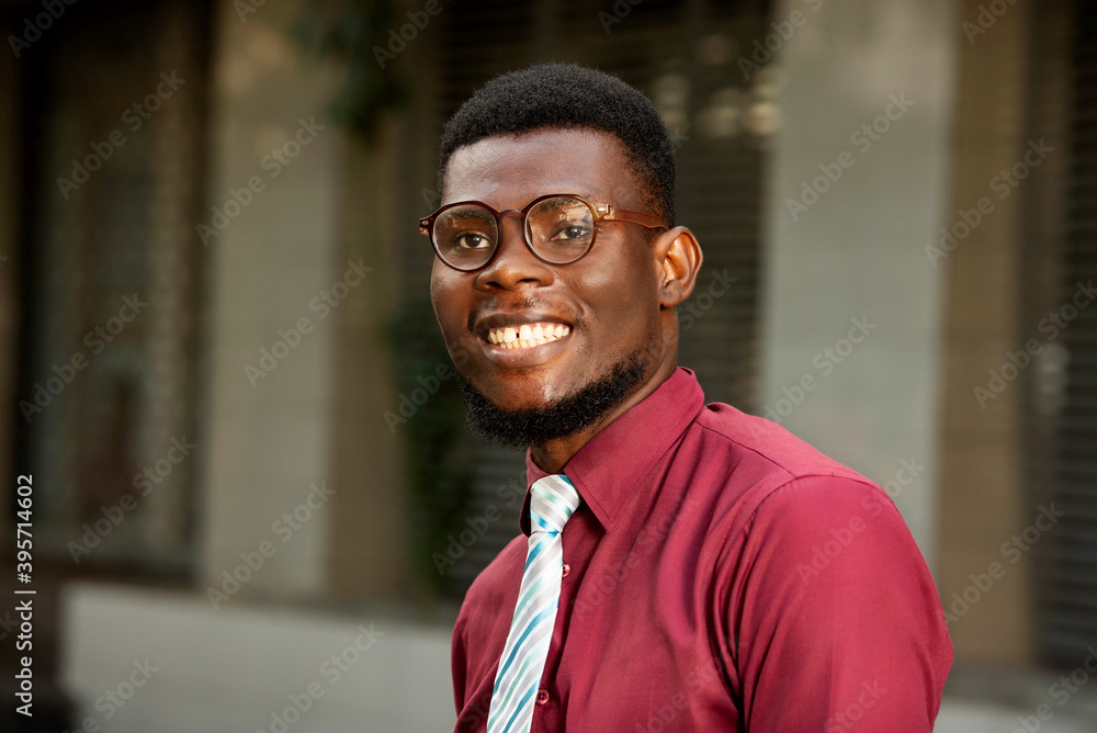 Portrait of a young student walking on the street Portrait of a young student walking on the street