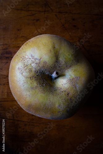 Renette apples on wooden table. Top view photo