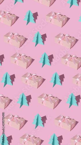 Creative Christmas pattern made of gift box and paper pine tree and trend shadows on pastel pink background. Minimal December New Year concept. Flat lay.