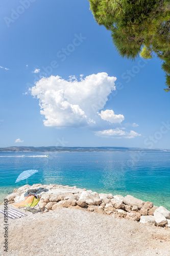 Fototapeta Naklejka Na Ścianę i Meble -  Amazing Croatian clean beaches with blue sky in Brela, Dalmatia, Croatia