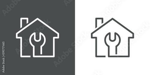 Logotipo con herramienta llave en contorno de casa con lineas en fondo gris y fondo blanco