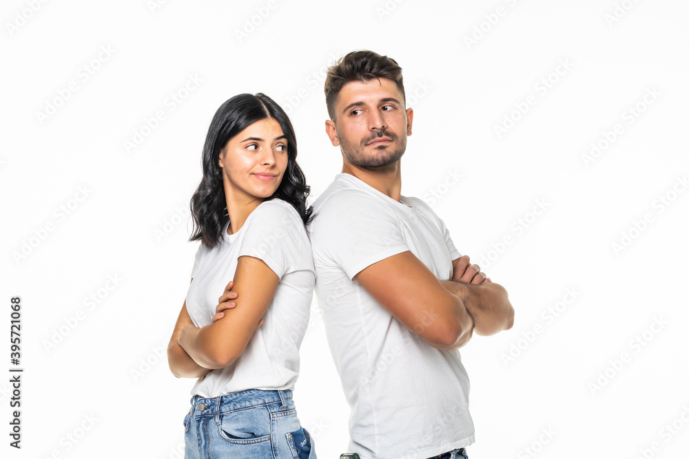Portrait of smiling couple back to back.Isolated on white background Portrait of smiling couple back to back.Isolated on white background