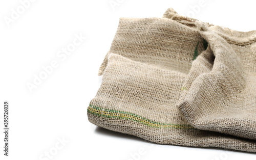 Jute sack, old vintage linen sackcloth bag isolated on white background