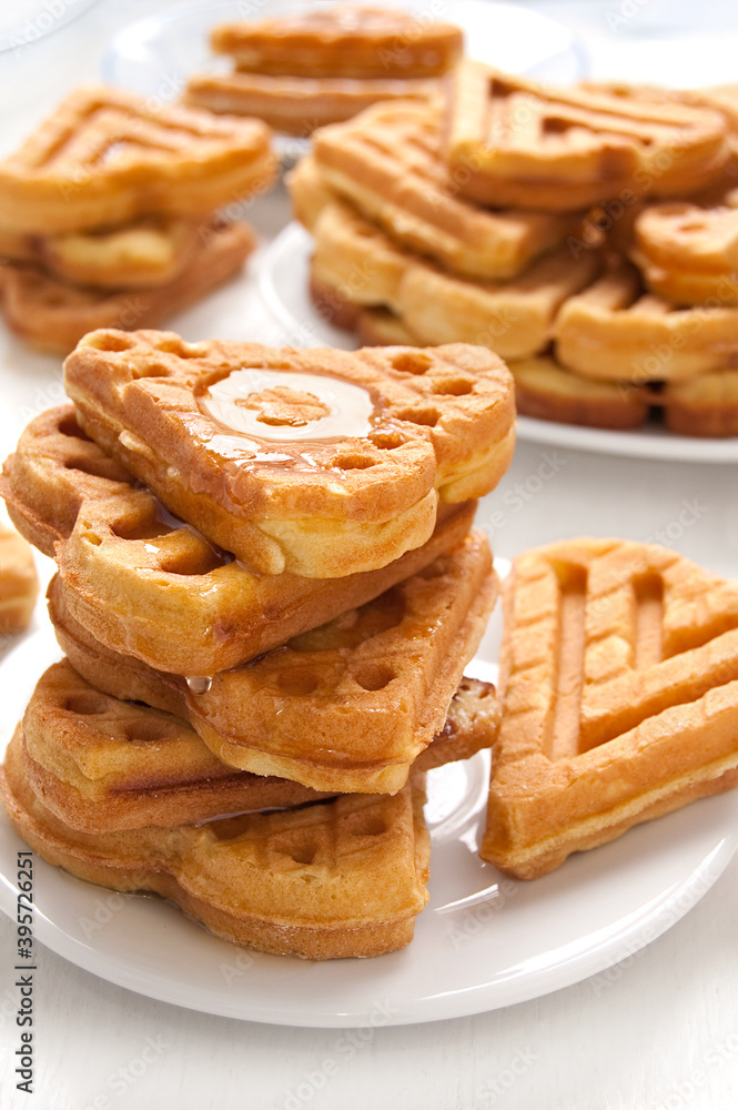 Morning breakfast with waffles in the shape of heart, homemade food Morning breakfast with waffles in the shape of heart, homemade food