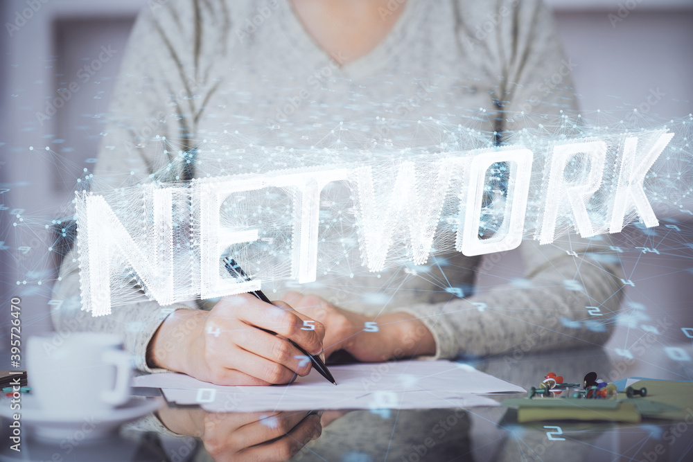 Double exposure of writing hand on background with data solution technology hologram. Ai concept. Double exposure of writing hand on background with data solution technology hologram. Ai concept.