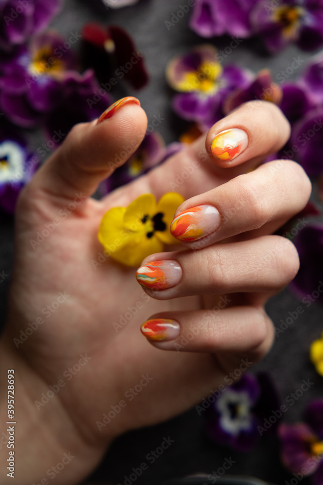 Hand of the woman with flowers
