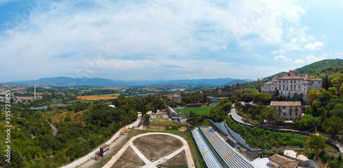 Panoramic aerial. Narni (Terni, Umbria, Italy), medieval city with a rich history. View of the city sports camp, football field and stands. Incredible views. Summer day.