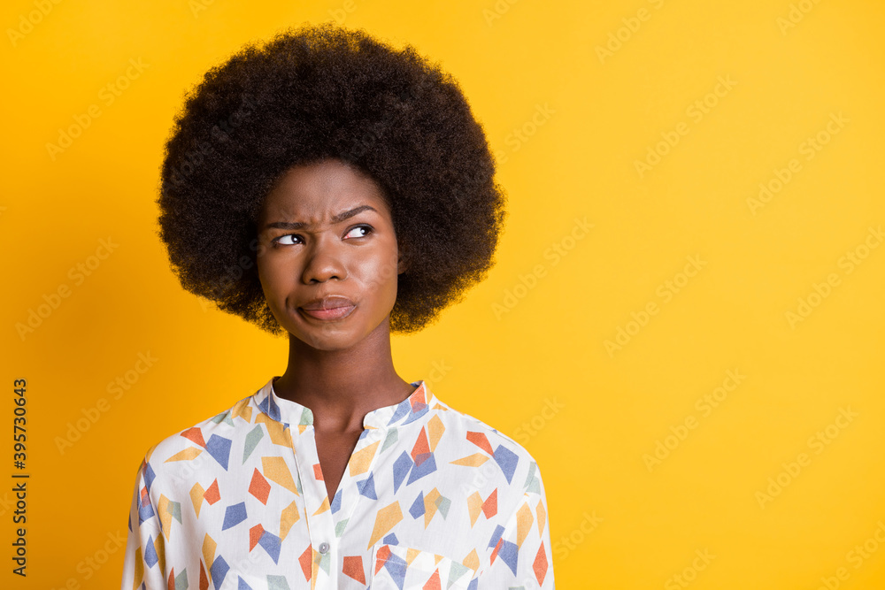 Photo of attractive lady thinking look empty space trying to make decision isolated on yellow color background Photo of attractive lady thinking look empty space trying to make decision isolated on yellow color background