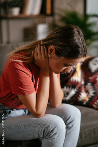 Young woman waiting results from the laboratory. Worried woman waiting Covid-19 test.