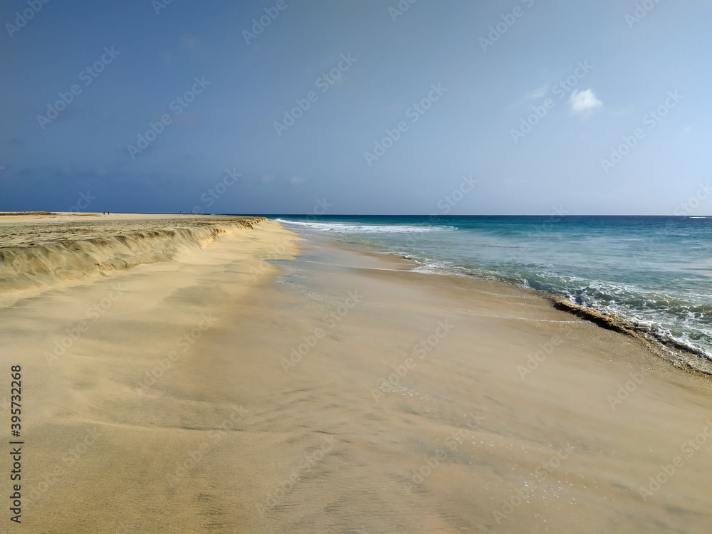 Ocean and sandy beach on sunny day on island Sal, Cape Verde