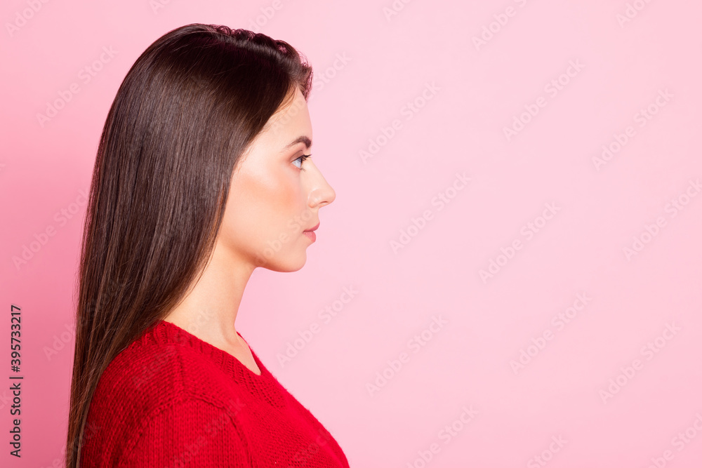 Profile photo of young lovely calm lady look empty space wear red pullover isolated pink color background Profile photo of young lovely calm lady look empty space wear red pullover isolated pink color background