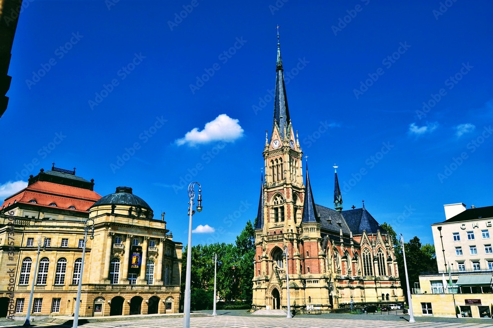 Fototapeta premium Chemnitz, East Germany, 09.09.2011.Opera and theatre (art) house, st. peter church and blue sky in the old culture center of Chemnitz.