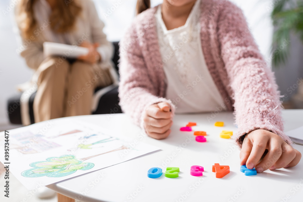cropped view of girl patient calculating with figures while visiting psychologist, stock image cropped view of girl patient calculating with figures while visiting psychologist, stock image