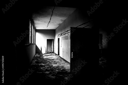 BULGARIA, KARDZHALI, 19.08.2011. Old education materials inside abandoned and brownfield school. Black and white photo