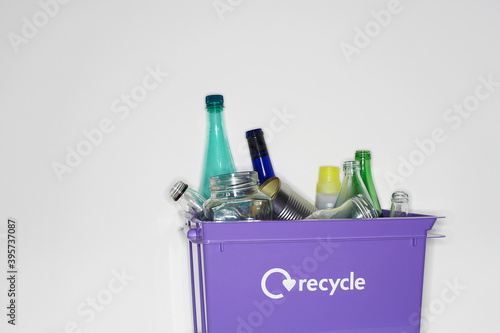 Recycling Container Filled With Jars And Bottles