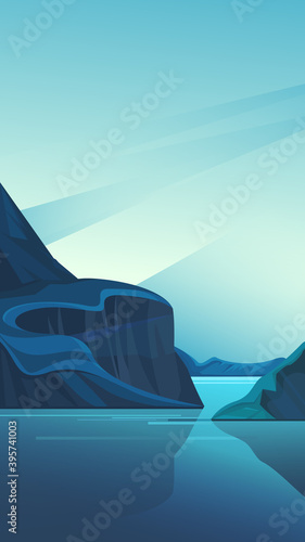 Fjord with blue water. Nature landscape in vertical orientation.