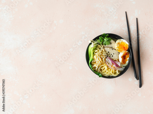 Chicken ramen noodle soup with meat, bok choy, mushrooms, egg