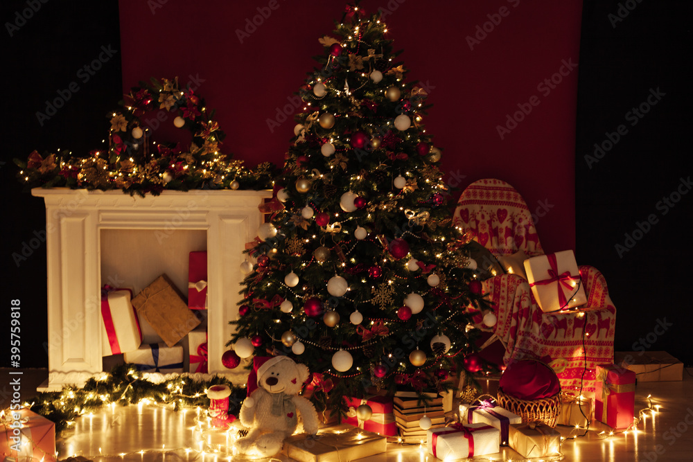 Christmas tree garland lights with New Year's Eve gifts