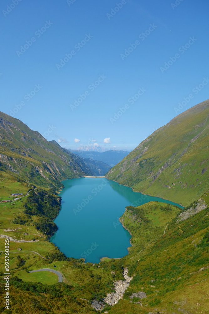 Panoramic view of Reservoir Mooserboden embedded in the impressive mountains of the Hohe Tauern near Kaprun, Austria.