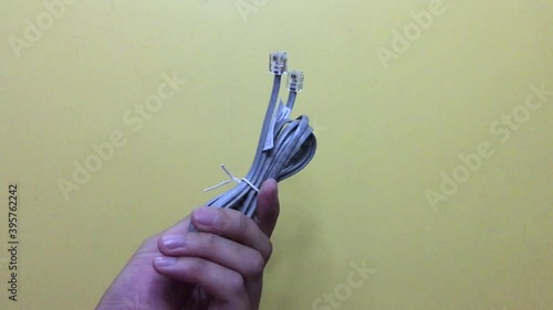 unused rj11 telephone cable and tied tightly photo