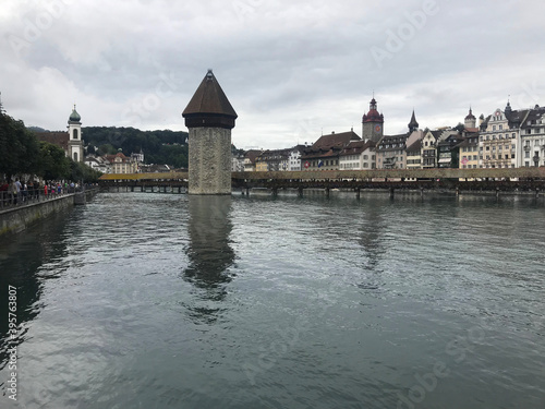 Historic city center of Lucerne with famous Chapel Bridge on Reuss River in Switzerland