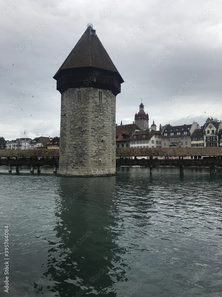 Historic city center of Lucerne with famous Chapel Bridge on Reuss River in Switzerland