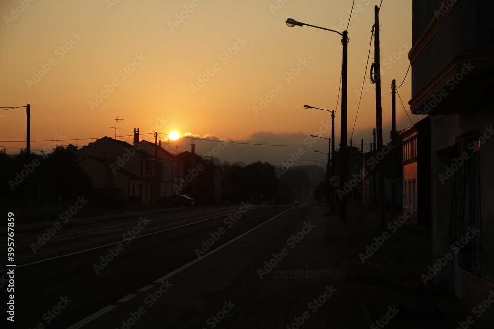 Sunrise in the road of a small town in spain