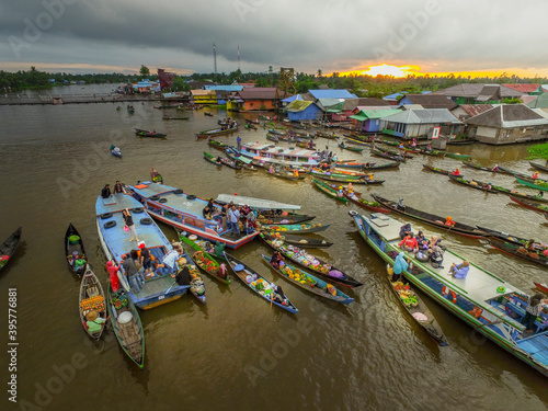 Banjarmasin Indonesia November 28, 2020 : Famous floating market in Indonesia, Lok Baintan floating market, tourists visiting by boat. Aerial Traditional Floating Market in Indonesia.
 photo