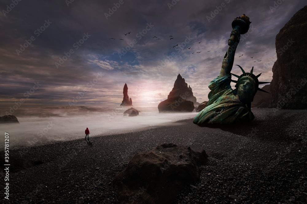 Statue of Liberty half buried in the sand on the beach Stock Photo ...