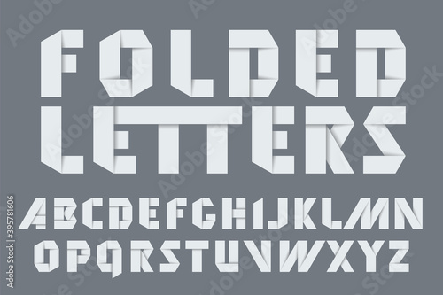 Set of latin letters made of folded paper ribbons Origami alphabet. Vector stylized paper font.