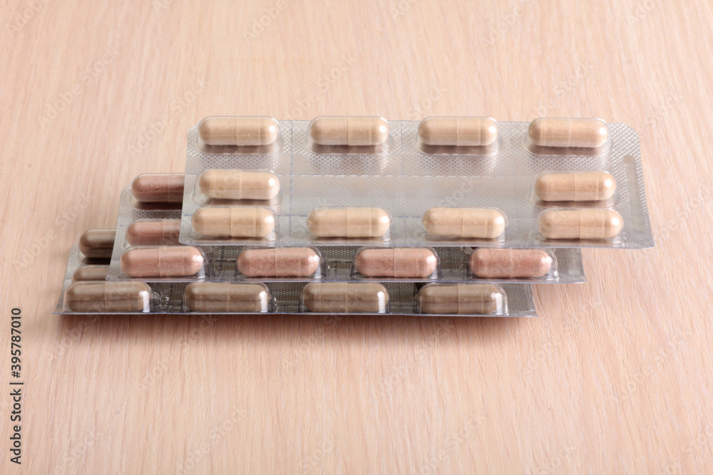 Medical pills in pack close-up on the table Medical pills in pack close-up on the table