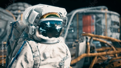 Obraz na płótnie An astronaut stands beside his lunar rover at the space moon base
