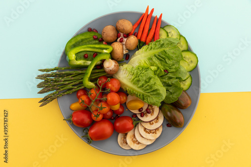High angle view of freshly cut vegetables on grey plate