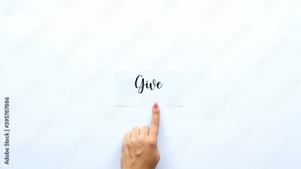 Female finger showing on a word Female finger showing on a word