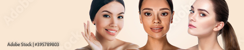 Multi-ethnic beauty skin. Three women of different ethnicity with natural shiny skin on beige pastel background