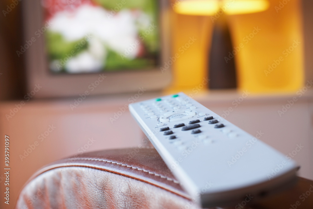 Remote Control And TV In Living Room