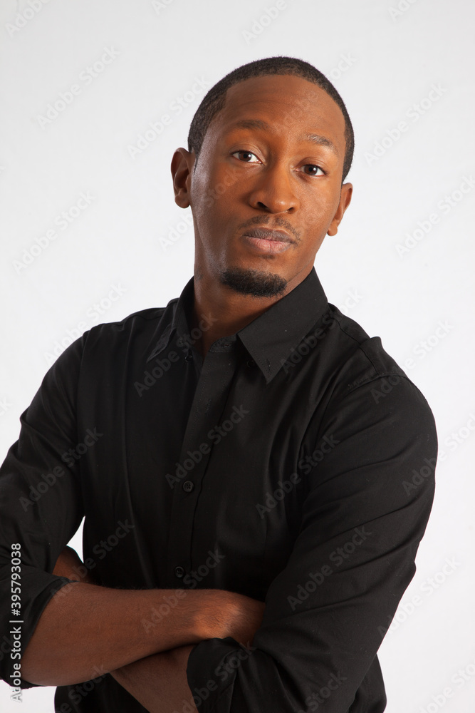 Handsome Black man with a thoughtful expression Handsome Black man with a thoughtful expression