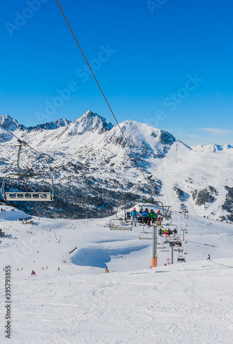 Elevator cabin about the station in ski resort. View of mountains, Pyrenees, Andorra, winter sunny day © Nikolai Korzhov