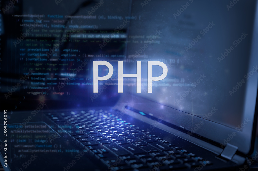 PHP inscription against laptop and code background. Learn php programming language, computer courses, training. PHP inscription against laptop and code background. Learn php programming language, computer courses, training.