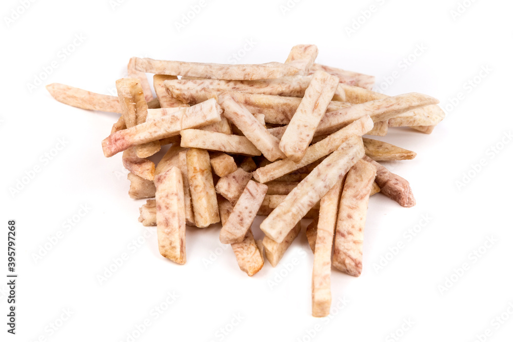 Pile of dehydrated taro snack sticks isolated over white Pile of dehydrated taro snack sticks isolated over white
