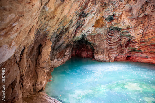 Turquoise-green lake in the Proval cave. Pyatigorsk. Stavropol region. Russia