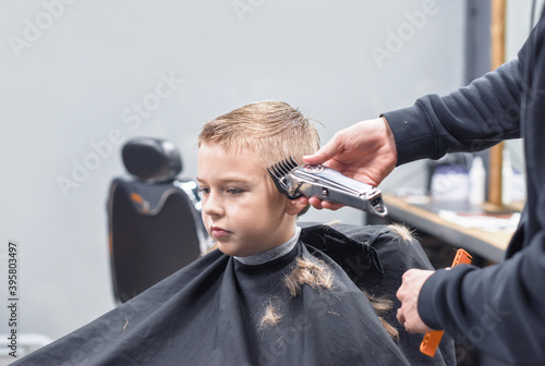 barber makes a hair