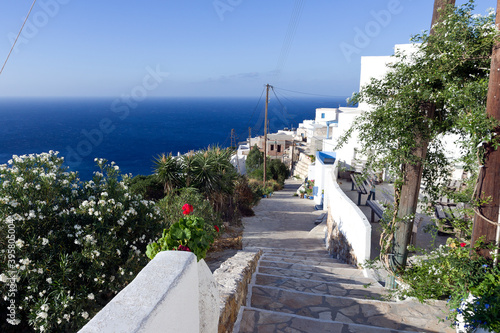 Beautiful panoramic view of Anafi village,  narrow cobbled staircase from the main road of Chora - Cyclades islands, Greece
