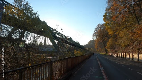 Road and indutrial metalic structure for train over river photo