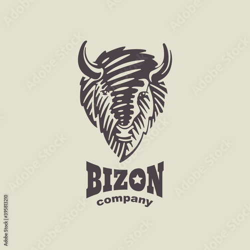 American bison head emblem in classic engraving style.