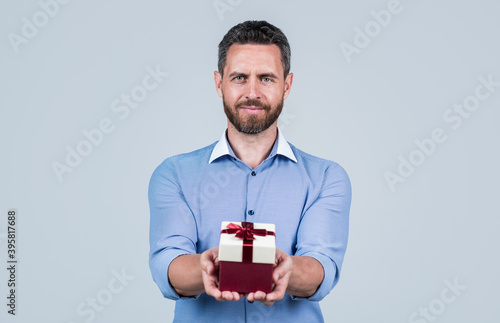 Happy birthday to you. Handsome man give birthday present. Anniversary celebration. Holiday greetings. Gift shop. Occasion makes special